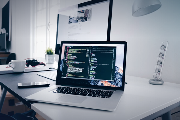 Laptop with code editor for modern development stack